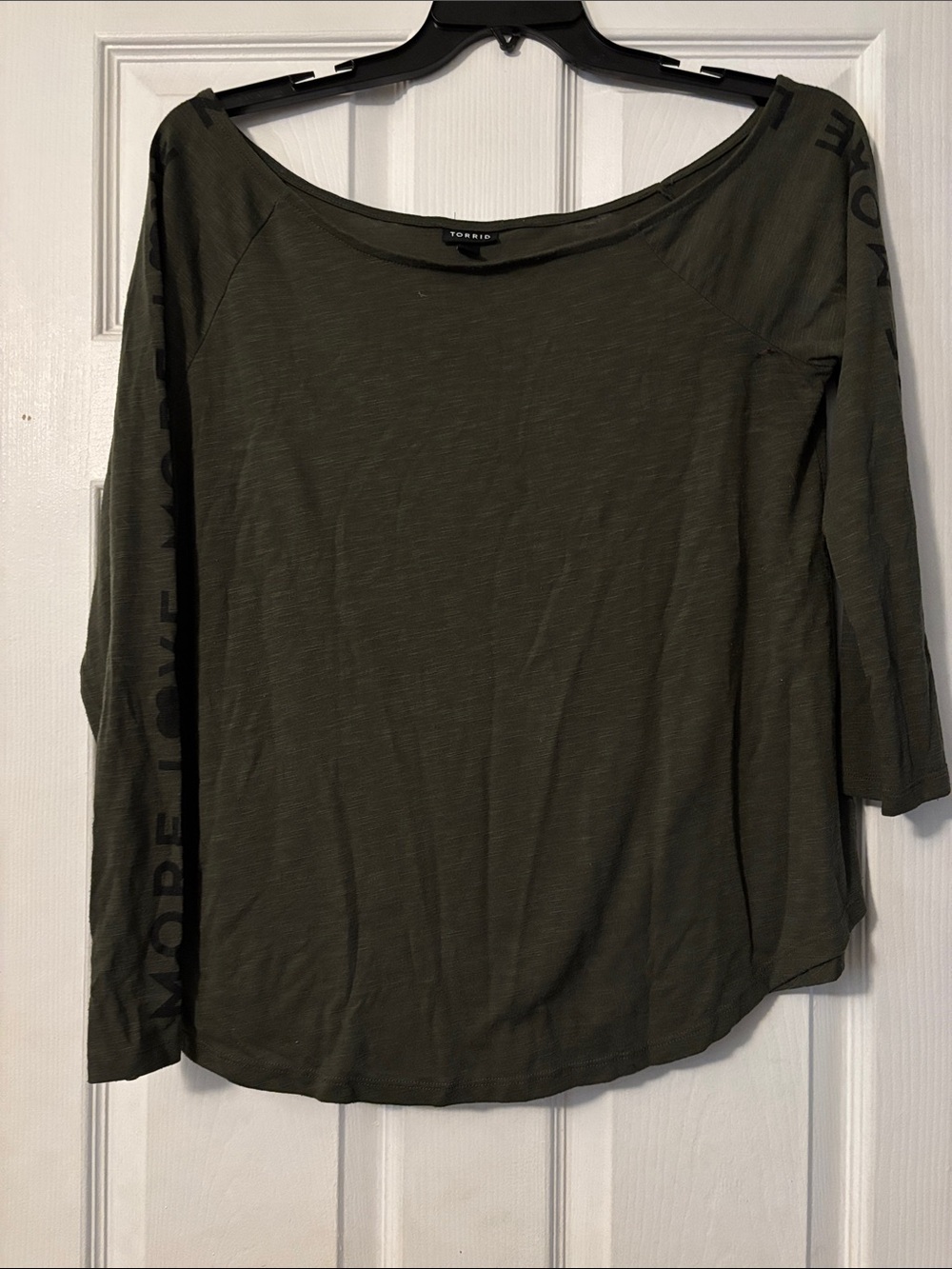 torrid olive green long sleeve boatneck top with sleeve text